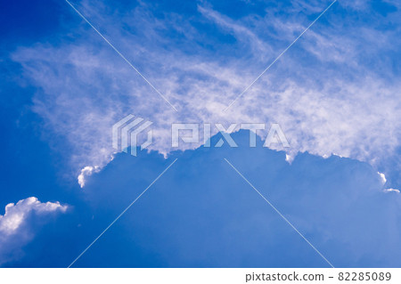 Light behind the clouds in the blue sky Light behind the clouds in the blue sky 82285089