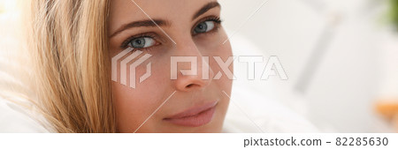 Young beautiful woman waking up in the morning 82285630