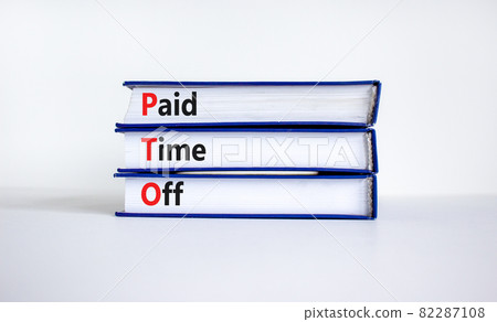 PTO, Paid time off symbol. Books with concept words 'PTO, Paid time off'. Beautiful white background, copy space. Business and PTO, paid time off concept. 82287108