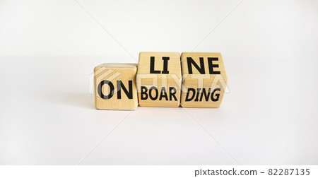 Online onboarding symbol. Turned wooden cubes with words 'online onboarding'. Beautiful white background, copy space. Business, online onboarding concept. 82287135
