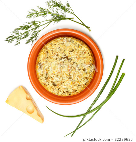Cheese casserole with herbs isolated on white . Cheese casserole with herbs isolated on white . 82289653