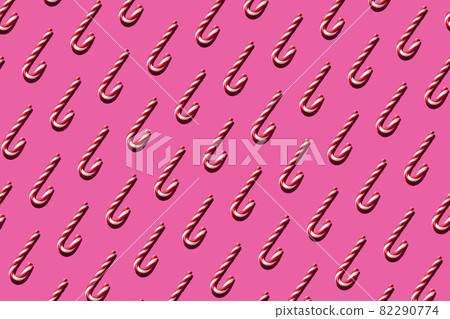 Christmas seamless candy cane pattern on pink background Christmas seamless candy cane pattern on pink background 82290774