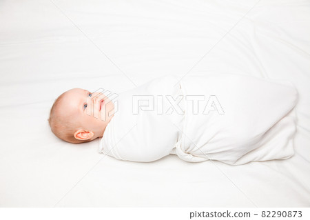 Swaddled infant Swaddled infant 82290873
