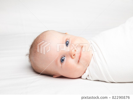 Swaddled infant Swaddled infant 82290876
