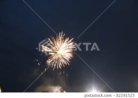 fireworks salute white on a dark black background holiday Christmas new year atmosphere fireworks salute white on a dark black background holiday Christmas new year atmosphere 82291525