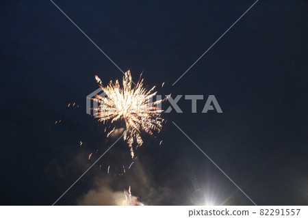 fireworks salute white on a dark black background holiday Christmas new year atmosphere fireworks salute white on a dark black background holiday Christmas new year atmosphere 82291557