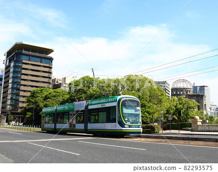 Hiroshima Electric Railway, tram running in Hiroshima city (in front of the Atomic Bomb Dome) Hiroshima Electric Railway, tram running in Hiroshima city (in front of the Atomic Bomb Dome) 82293575