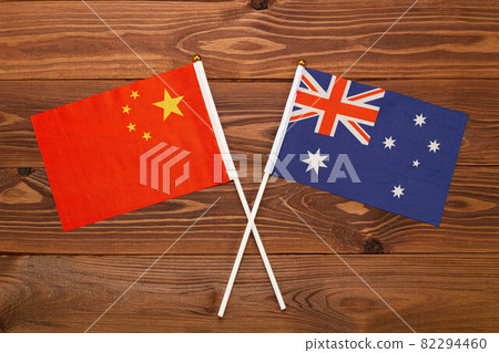 Flag of China and flag of Australia crossed with each other. China vs Australia Flag of China and flag of Australia crossed with each other. China vs Australia 82294460