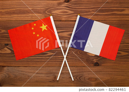 Flag of China and flag of France crossed with each other. China vs France Flag of China and flag of France crossed with each other. China vs France 82294461