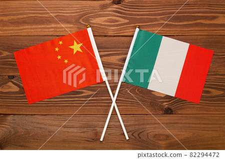 Flag of China and flag of Italy crossed with each other. China vs Italy Flag of China and flag of Italy crossed with each other. China vs Italy 82294472