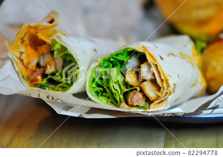 kebab ,pork wraps or taco or vegetable roll or mexican rolls kebab ,pork wraps or taco or vegetable roll or mexican rolls 82294778