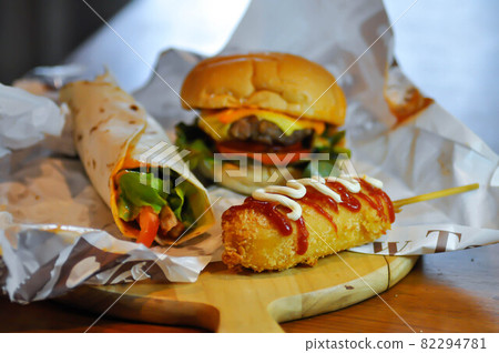 corn dog, pork sausage or breaded sausage with burger and kebab corn dog, pork sausage or breaded sausage with burger and kebab 82294781