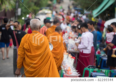 Old Mon monk alms in Mon village, Sangkhla Buri 82295544