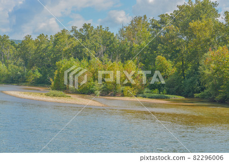 The Current River flows through the Ozark National Scenic Riverway through the mountains of Missouri The Current River flows through the Ozark National Scenic Riverway through the mountains of Missouri 82296006