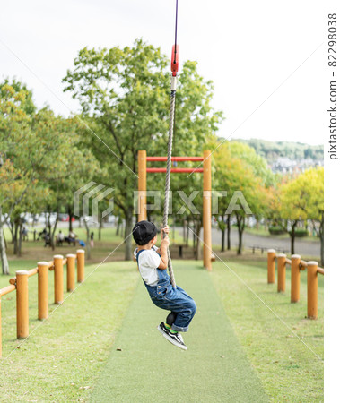 Children playing in the park Children playing in the park 82298038