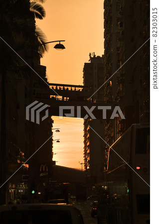 the sunset at street through Midtown Shek Tong Tsui, hk 23 Aug 2021 82303015