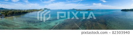 Aerial view drone shot of Amazing panorama tropical sea Beautiful scenery andaman sea and small island in summer season at phuket thailand Beautiful travel background and website design nature view 82303940