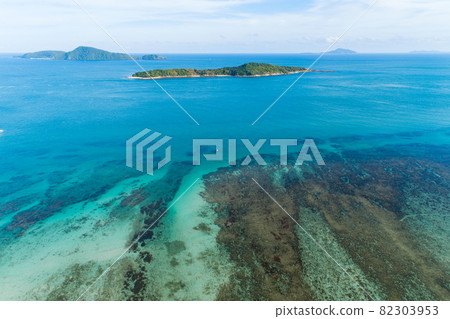Aerial view drone shot of tropical sea at rawai beach Phuket Thailand Beautiful scenery andaman sea and small island in summer season Beautiful travel background and website design nature view Aerial view drone shot of tropical sea at rawai beach Phuket Thailand Beautiful scenery andaman sea and small island in summer season Beautiful travel background and website design nature view 82303953