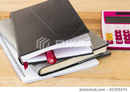 notebook planner, calculator for business work arrangement flat lay style  82305874