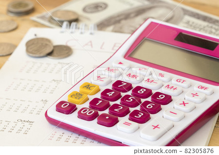 calculator, calendar and money for business of lifetyle arrangement flat lay style 82305876