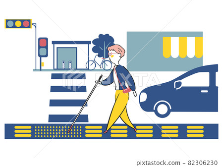 A visually impaired woman walking on a braille block approaching a pedestrian crossing near the ticket gate of a station with a white cane Illustration material 82306230