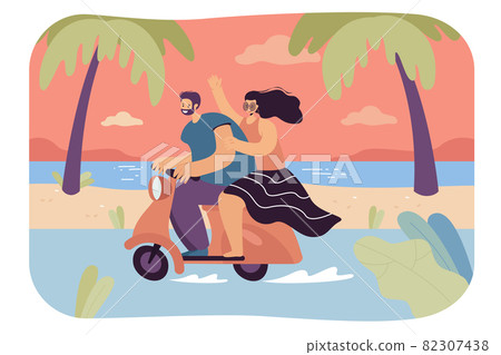Happy man and woman riding motorbike along seaside 82307438