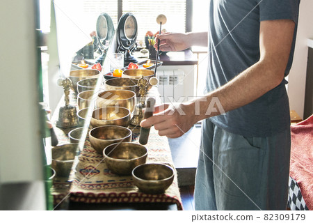 Tibetan singing bowls in sound therapy in spa center 82309179