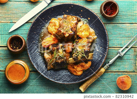 Beef ribs in apricots Beef ribs in apricots 82310942