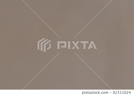 Brown color wrapping paper sheet abstract background. Full frame. Copy Space. 82311024
