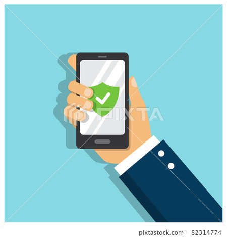 A man's hand holds a phone protected by a strong password and a green sign with a check mark on the screen  82314774