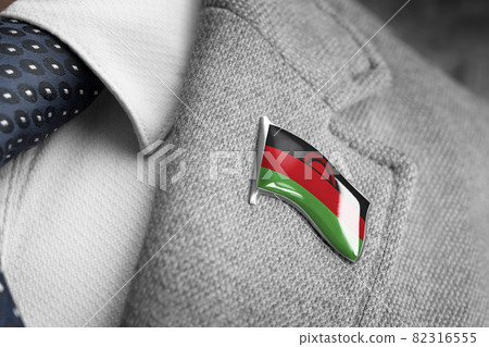 Metal badge with the flag of Malawi on a suit lapel Metal badge with the flag of Malawi on a suit lapel 82316555