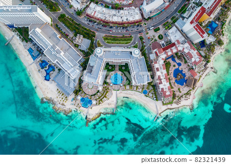 Aerial panoramic view of Cancun beach and city hotel zone in Mexico. Caribbean coast landscape of Mexican resort with beach Playa Caracol and Kukulcan road. Riviera Maya in Quintana roo region on 82321439