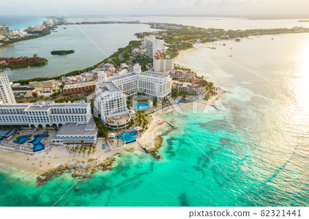 Aerial panoramic view of Cancun beach and city hotel zone in Mexico. Caribbean coast landscape of Mexican resort with beach Playa Caracol and Kukulcan road. Riviera Maya in Quintana roo region on 82321441