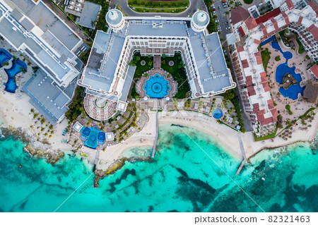 Aerial top view of Cancun beach and city hotel zone in Mexico. Caribbean coast landscape of Mexican resort with beach Playa Caracol and Kukulcan road. Riviera Maya in Quintana roo region on Yucatan 82321463
