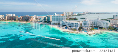 Aerial panoramic view of Cancun beach and city hotel zone in Mexico. Caribbean coast landscape of Mexican resort with beach Playa Caracol and Kukulcan road. Riviera Maya in Quintana roo region on 82321481