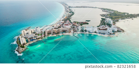 Aerial panoramic view of Cancun beach and hotel zone in Mexico. Caribbean coast landscape of Mexican resort. Riviera Maya in Quintana roo region on Yucatan Peninsula 82321658
