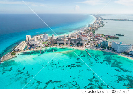 Aerial panoramic view of Cancun beach and city hotel zone in Mexico. Caribbean coast landscape of Mexican resort with beach Playa Caracol and Kukulcan road. Riviera Maya in Quintana roo region on 82321665