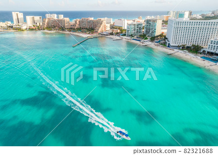 Aerial panoramic view of Cancun beach and city hotel zone in Mexico. Caribbean coast landscape of Mexican resort with beach Playa Caracol and Kukulcan road. Riviera Maya in Quintana roo region on 82321688