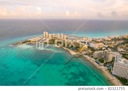 Aerial panoramic view of Cancun beach and city hotel zone in Mexico. Caribbean coast landscape of Mexican resort with beach Playa Caracol and Kukulcan road. Riviera Maya in Quintana roo region on 82321755