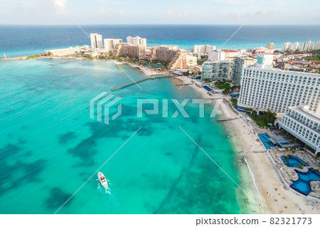 Aerial panoramic view of Cancun beach and city hotel zone in Mexico. Caribbean coast landscape of Mexican resort with beach Playa Caracol and Kukulcan road. Riviera Maya in Quintana roo region on 82321773