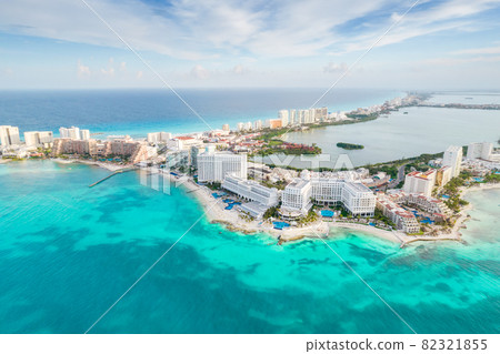 Aerial panoramic view of Cancun beach and city hotel zone in Mexico. Caribbean coast landscape of Mexican resort with beach Playa Caracol and Kukulcan road. Riviera Maya in Quintana roo region on 82321855
