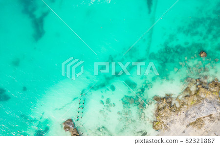 Aerial view of sandy beach and ocean with small waves in Cancun, Mexico. Top view from drone. Playa Caracol of Riviera Maya in Quintana roo region on the Yucatan Peninsula 82321887