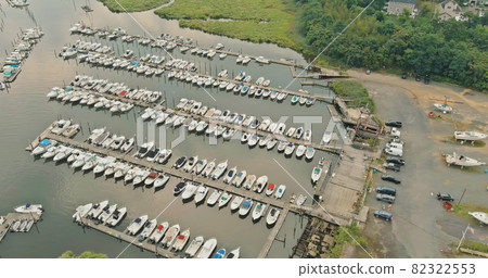 Aerial view boats in little port in ocean a little marina the dockside 82322553