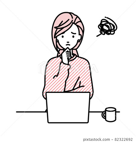 Remote work woman sitting at a desk and having trouble opening her PC Remote work woman sitting at a desk and having trouble opening her PC 82322692
