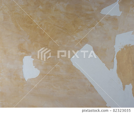 Yellow textured background of untidy rough surface wall pattern 82323035