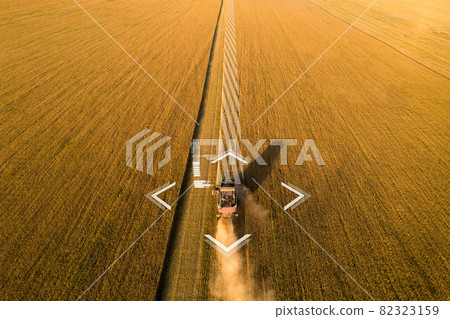 Autonomous harvester on the field 82323159