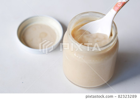 baby food in a container on table with copy space. 82323289