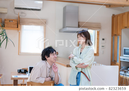 Young couple spending time at home Young couple spending time at home 82323659