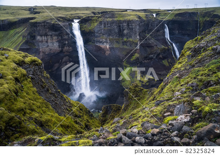 Dramatic landscape of epic Haifoss Waterfall in Landmannalaugar canyon, Iceland 82325824