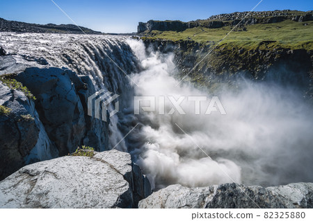 Amazing Iceland landscape at Dettifoss waterfall in Northeast Iceland region. Dettifoss is a waterfall in Vatnajokull National Park reputed to be the most powerful waterfall in Europe Amazing Iceland landscape at Dettifoss waterfall in Northeast Iceland region. Dettifoss is a waterfall in Vatnajokull National Park reputed to be the most powerful waterfall in Europe 82325880